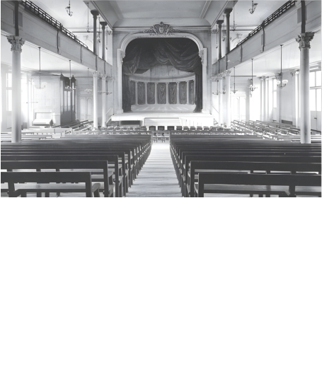 Former organ of the ‘Salle des fêtes du pensionnat de Passy’ (now the Lycée Saint-Jean de Passy, Paris, XVIth), probably disappeared or transferred. A photo or postcard dating back to 1895 shows this organ. The appearance of the organcase and the console in the side window are reminiscent of a Cavaillé-Coll organ. This organ had a different case and a whole Montre in front of the case (with two high side plates and two lower central plates), while the current organ in the chapel of the Lycée has only one pipe on either side of the expressive box. Thanks to Olivier Geoffroy for this information.